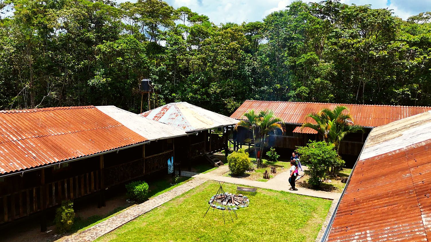 The base camp courtyard and rust-red roofs