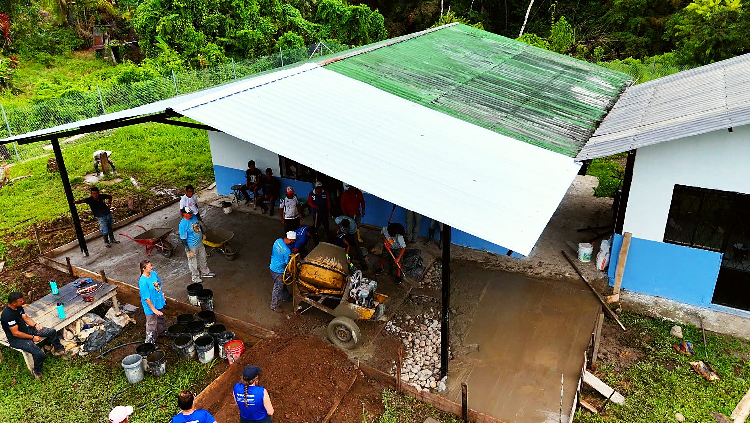 The medical center from above, with volunteers working under the new roof