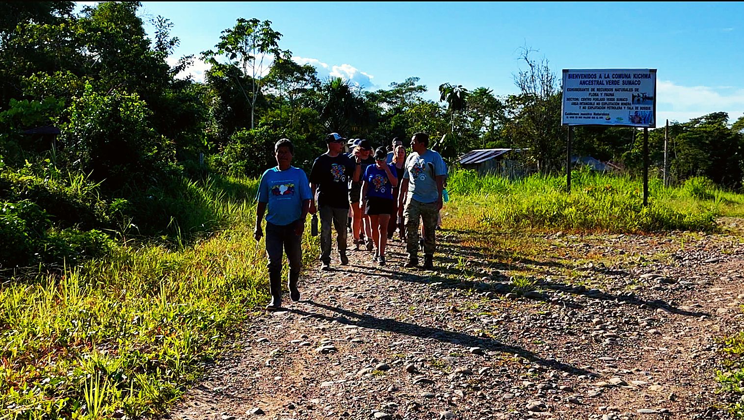 Guild volunteers walking through Verde Sumaco to the job sites